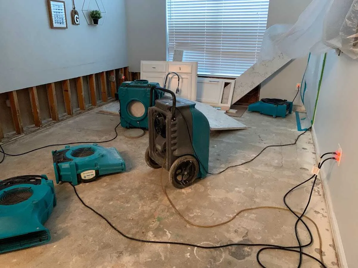 Dehumidifier in flood-cut room for Water Damage Restoration in Ambler